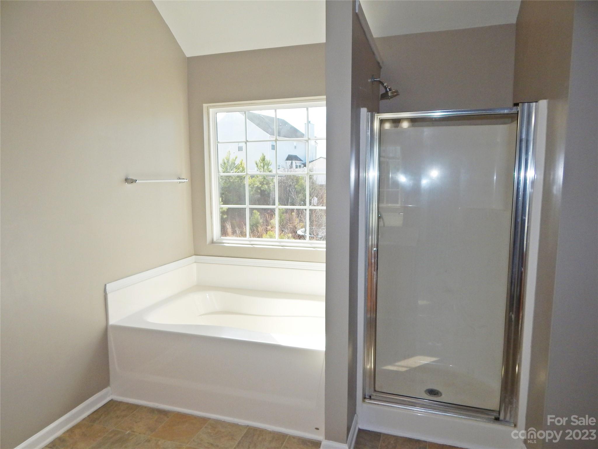 651 Fall Line Way Rock Hill, SC 29730 - Photo 18 of 25 a bathroom with a tub and shower