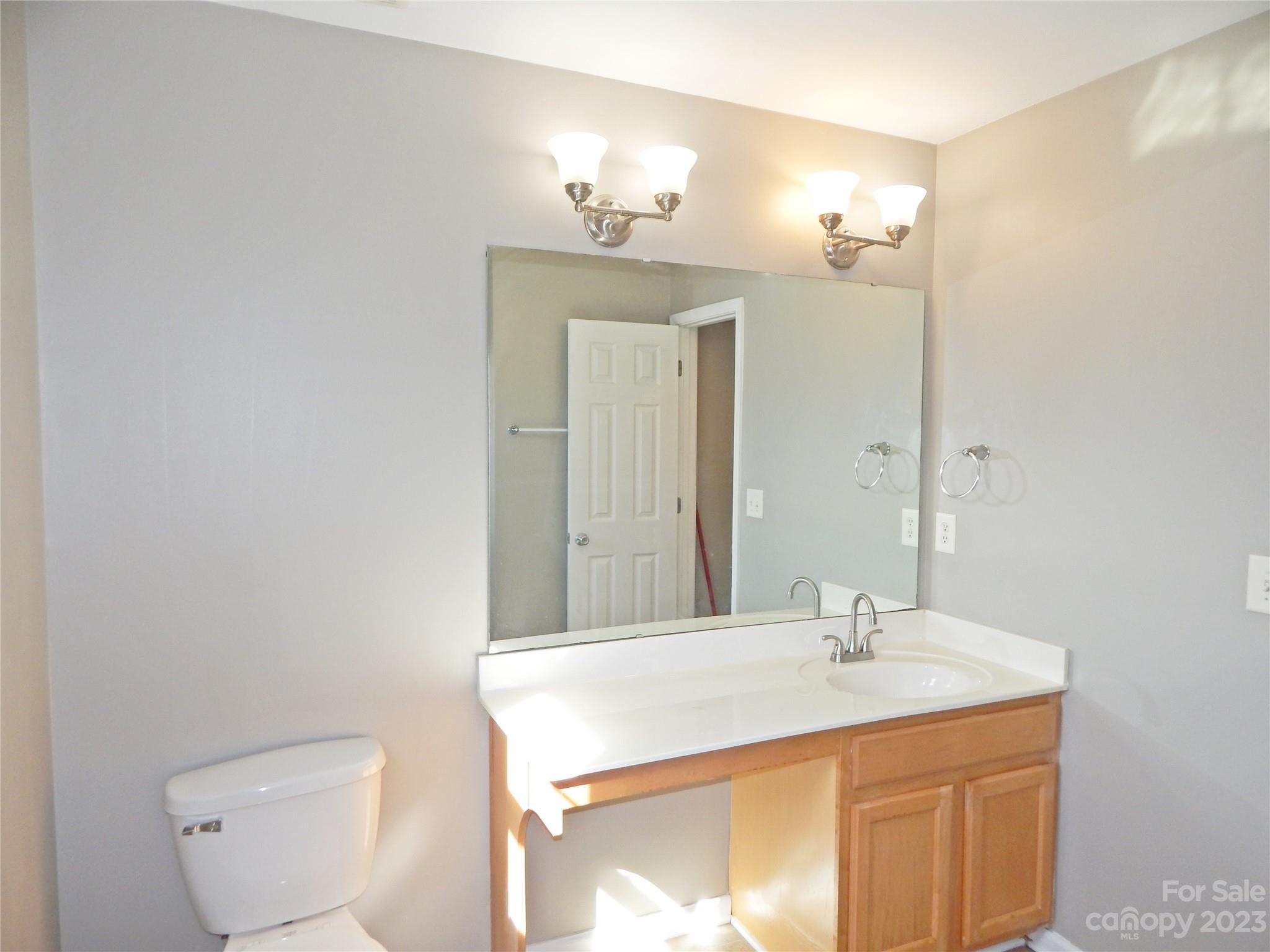 651 Fall Line Way Rock Hill, SC 29730 - Photo 23 of 25 a bathroom with a sink and a mirror