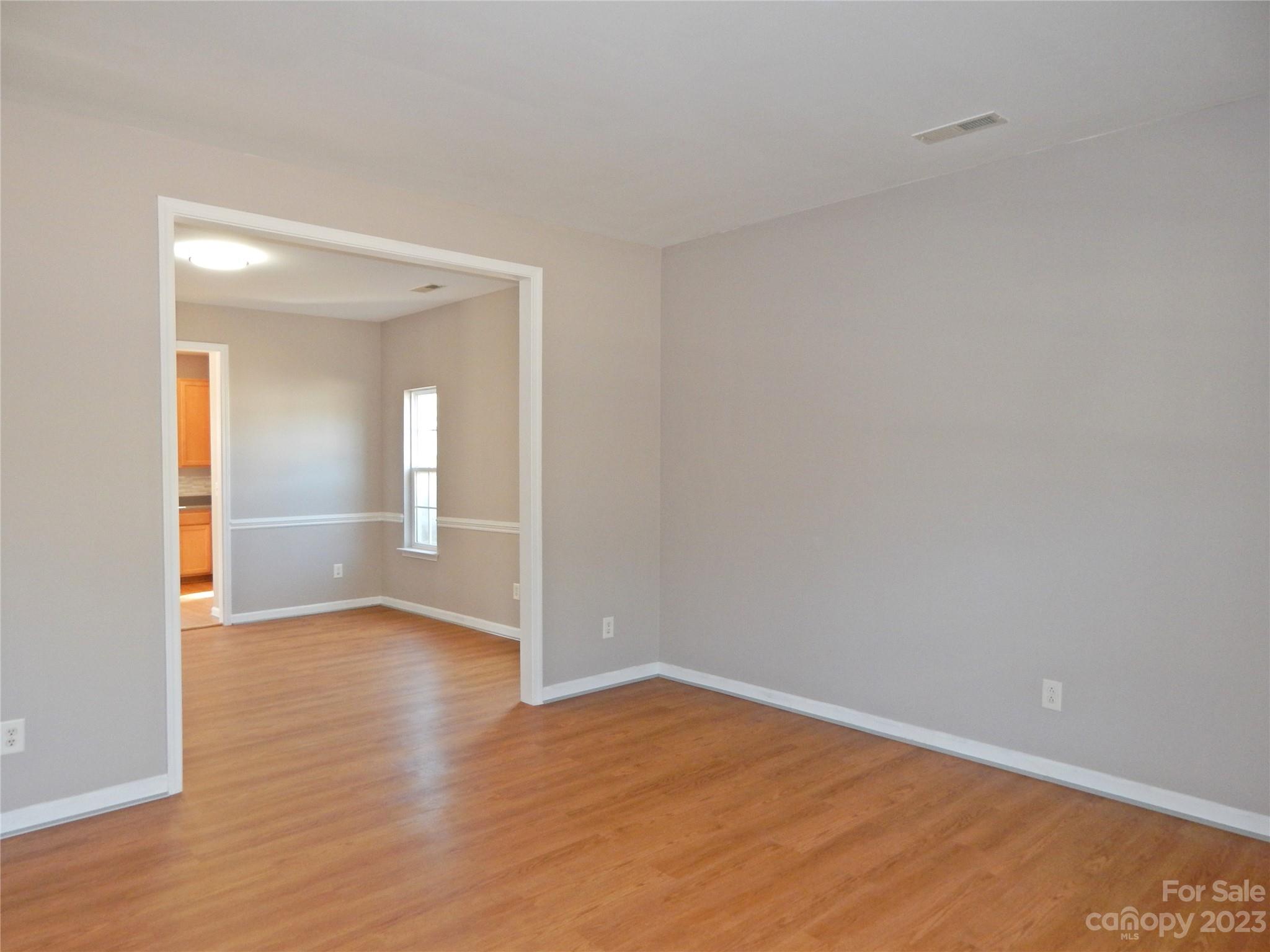 651 Fall Line Way Rock Hill, SC 29730 - Photo 4 of 25 a view of empty room with wooden floor and fan