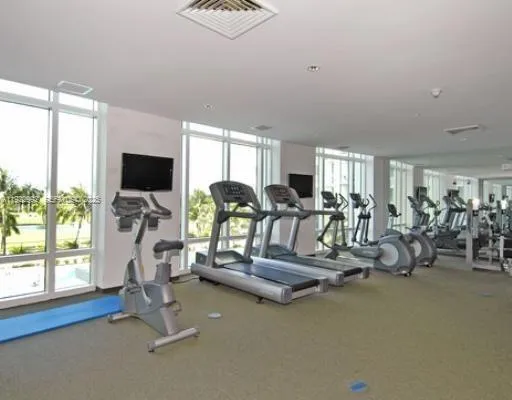 a view of a room with gym equipment