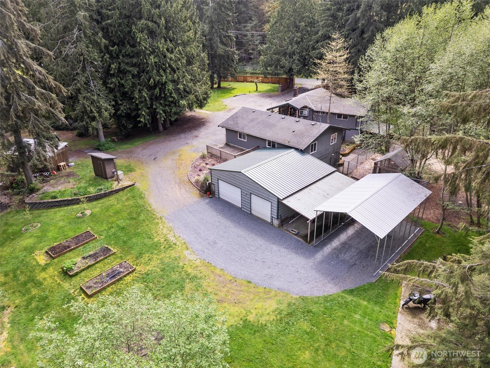 17629 Newberg Road Snohomish, WA 98290 - Photo 1 of 40 an aerial view of a house with garden space and street view