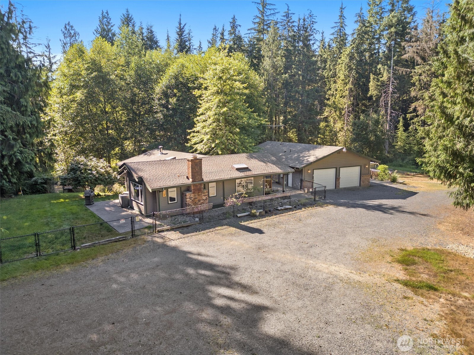 17629 Newberg Road Snohomish, WA 98290 - Photo 2 of 40 a view of a house with a yard and sitting area