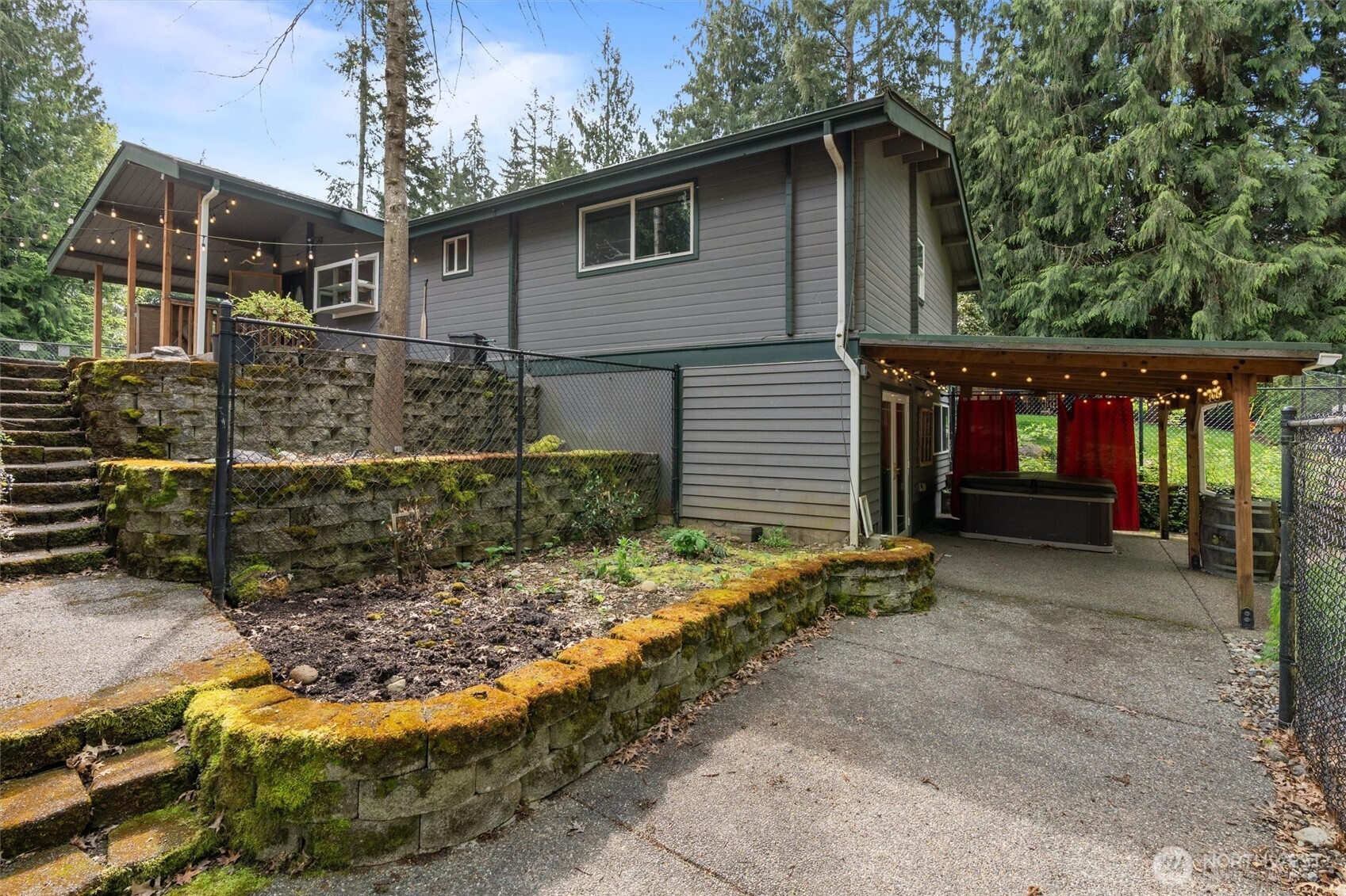 17629 Newberg Road Snohomish, WA 98290 - Photo 21 of 40 a backyard of a house with lots of green space