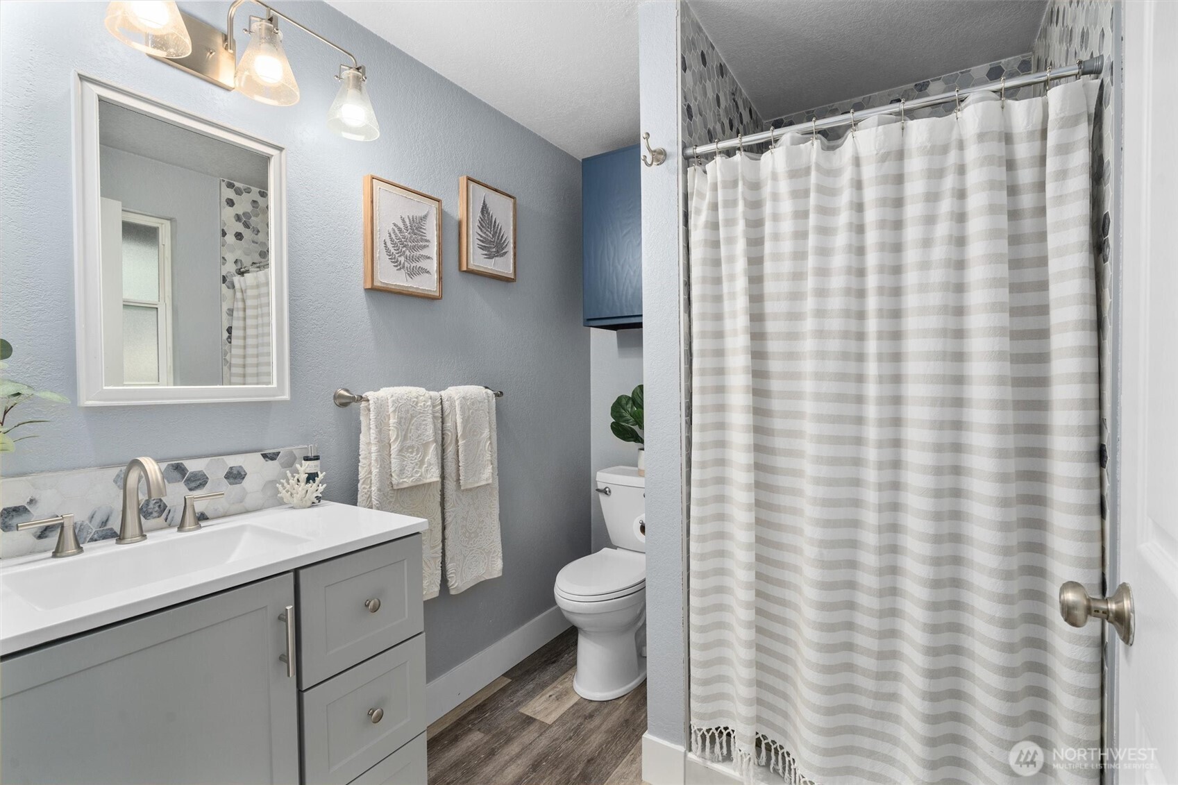 17629 Newberg Road Snohomish, WA 98290 - Photo 27 of 40 a bathroom with a sink toilet and shower