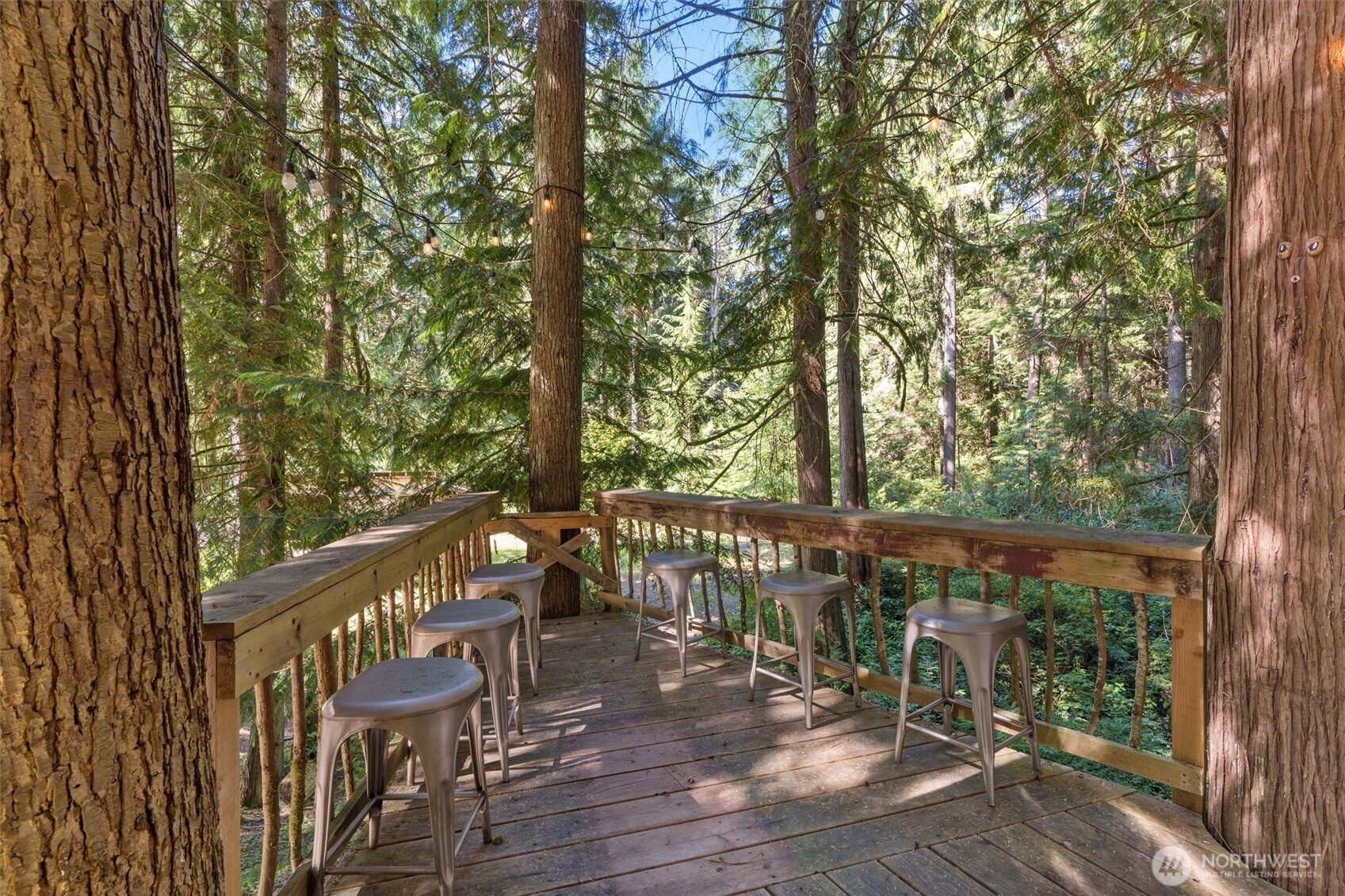 17629 Newberg Road Snohomish, WA 98290 - Photo 32 of 40 a view of a chair and table in the balcony