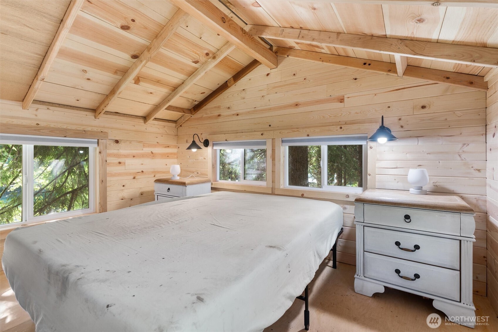 17629 Newberg Road Snohomish, WA 98290 - Photo 34 of 40 a spacious bedroom with a bed and a window