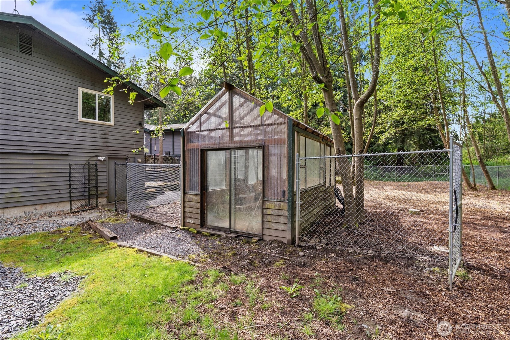 17629 Newberg Road Snohomish, WA 98290 - Photo 37 of 40 a view of a small house and a yard