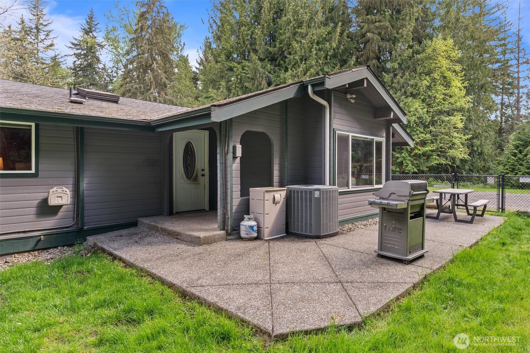17629 Newberg Road Snohomish, WA 98290 - Photo 5 of 40 a view of a backyard with barbeque grill and plants