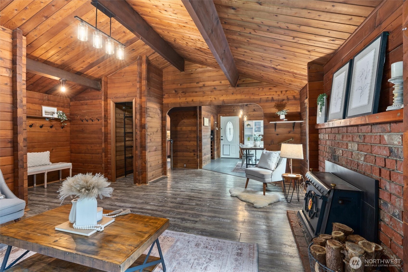 17629 Newberg Road Snohomish, WA 98290 - Photo 7 of 40 a living room with fireplace furniture and a wooden floor