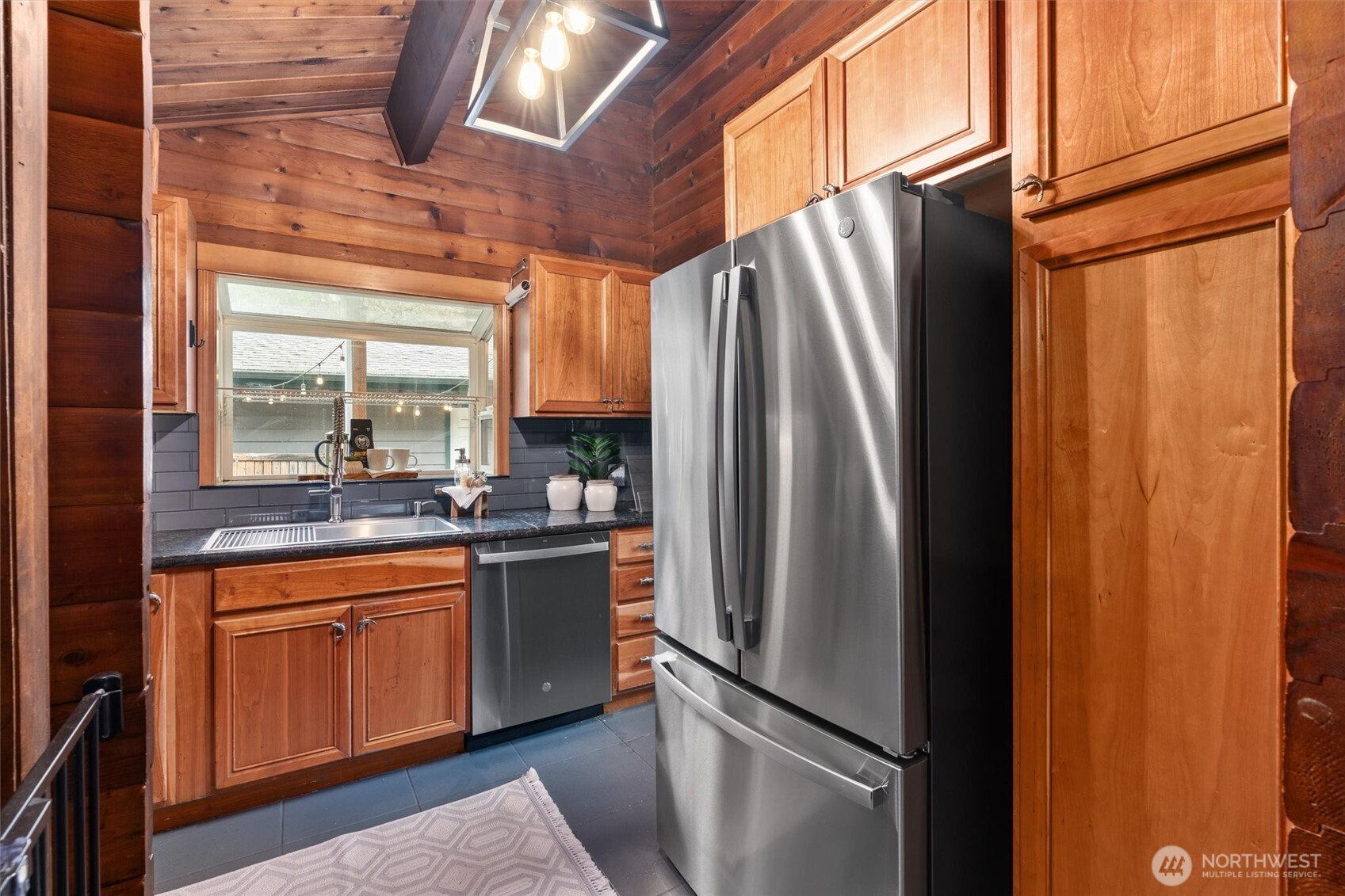 17629 Newberg Road Snohomish, WA 98290 - Photo 10 of 40 a kitchen with stainless steel appliances a refrigerator and a sink