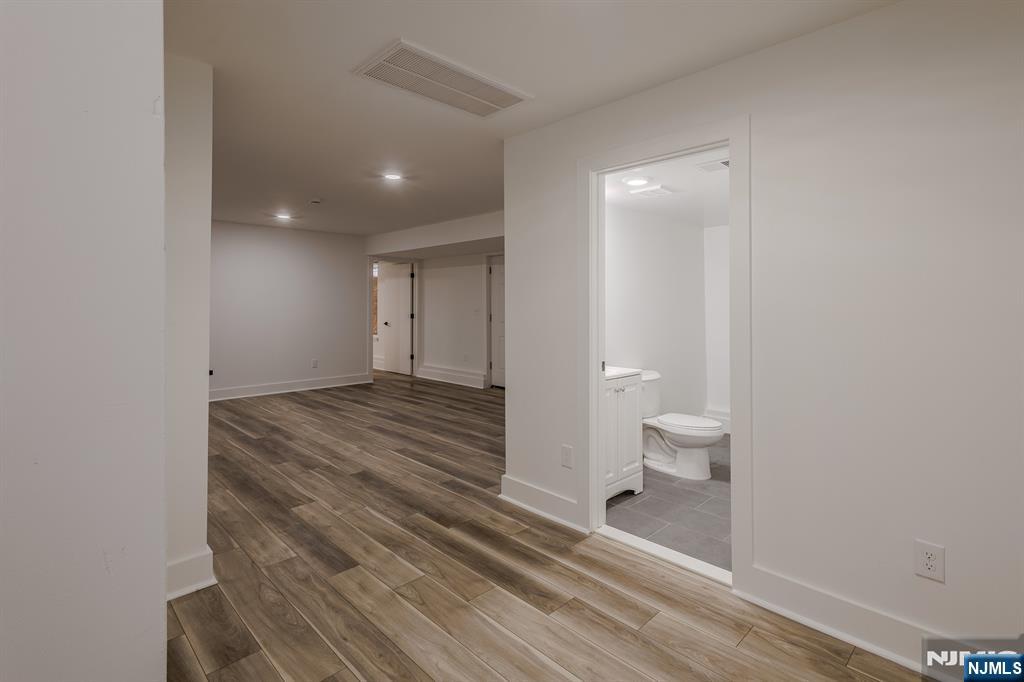 29 Kent Street Newark, NJ 07108 - Photo 22 of 30 a bathroom with a sink and a toilet