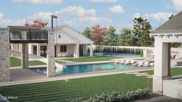 a view of house with a yard and sitting area