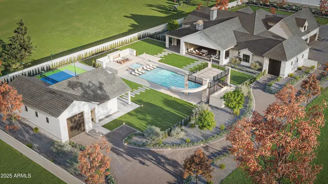 an aerial view of a house with a garden