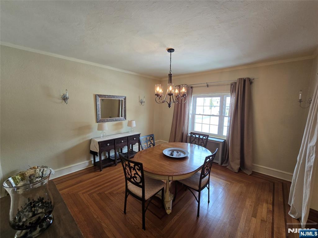 224 Cleveland Avenue Hasbrouck Heights, NJ 07604 - Photo 12 of 29 a view of a dining room with furniture window and wooden floor