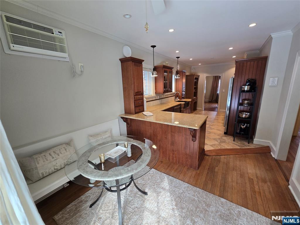 224 Cleveland Avenue Hasbrouck Heights, NJ 07604 - Photo 13 of 29 a room with furniture and a wooden floor