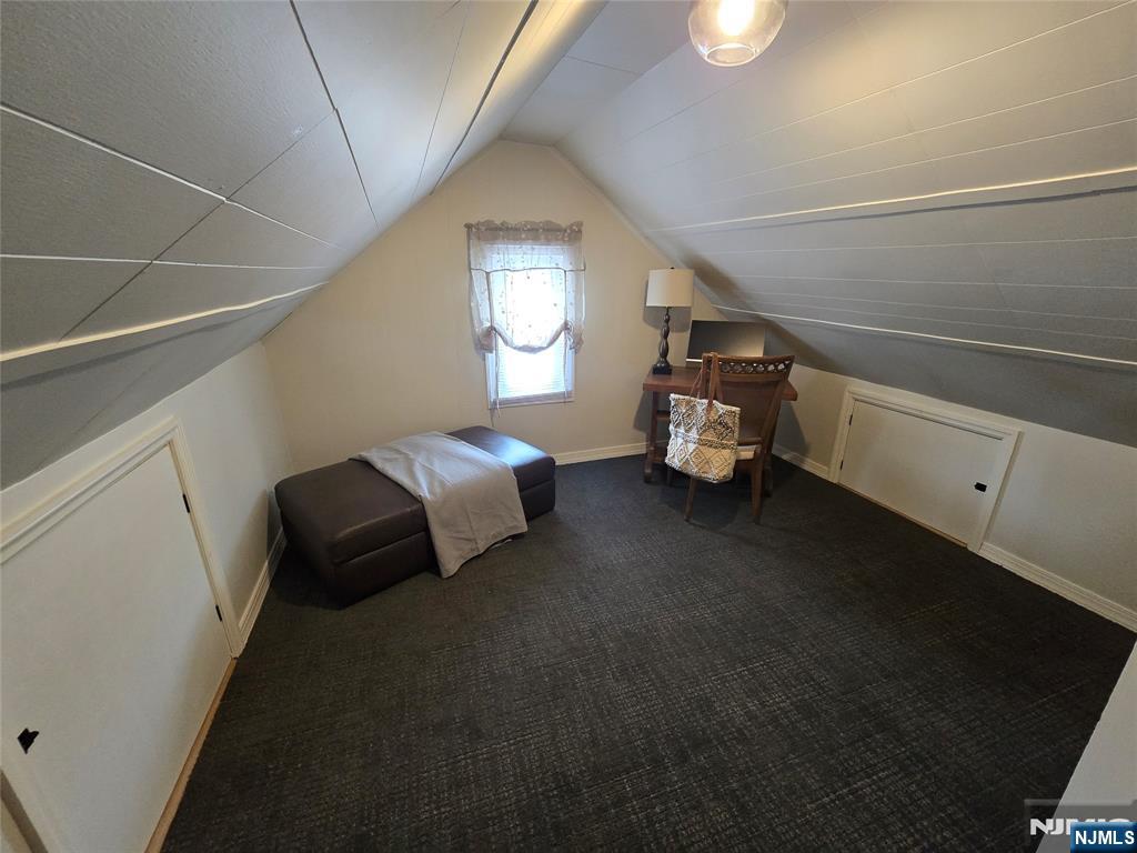 224 Cleveland Avenue Hasbrouck Heights, NJ 07604 - Photo 20 of 29 a bedroom with a bed and a window