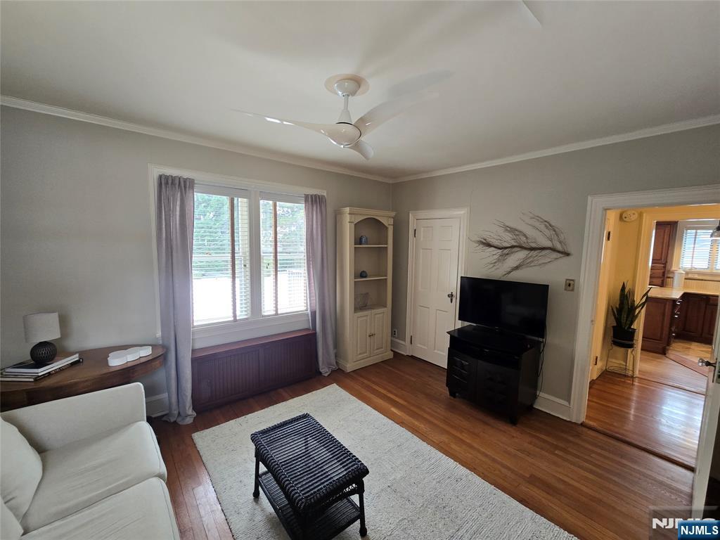 224 Cleveland Avenue Hasbrouck Heights, NJ 07604 - Photo 3 of 29 a living room with furniture and a flat screen tv