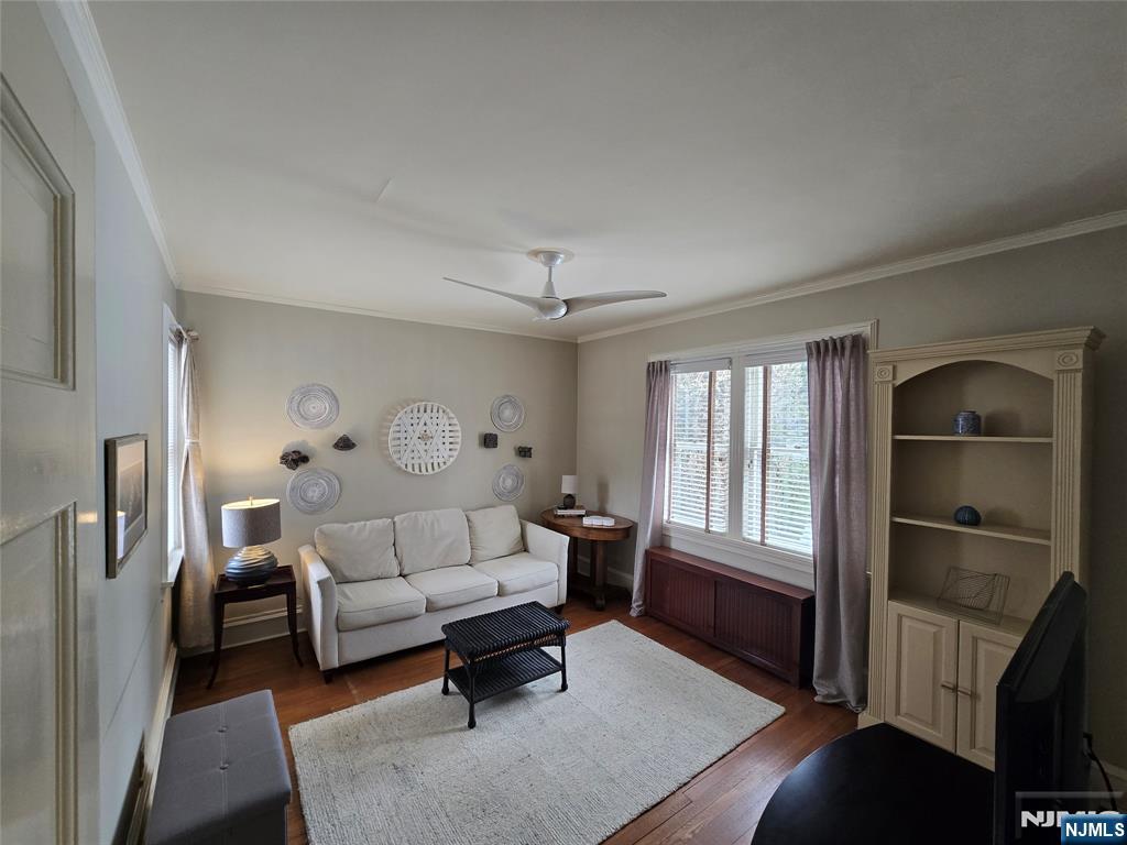 224 Cleveland Avenue Hasbrouck Heights, NJ 07604 - Photo 4 of 29 a living room with furniture a window and a table