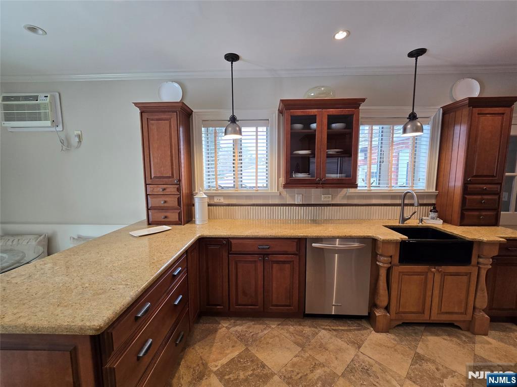 224 Cleveland Avenue Hasbrouck Heights, NJ 07604 - Photo 9 of 29 a kitchen with stainless steel appliances granite countertop a sink and a stove