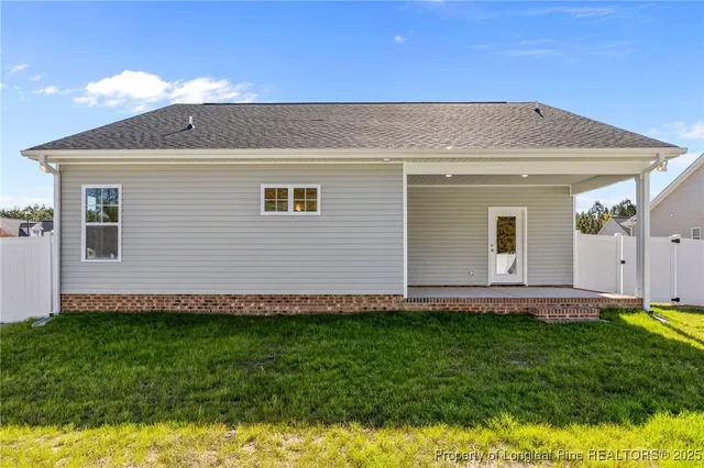 a view of a house with a garden
