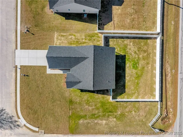 a view of a swimming pool with lounge chair
