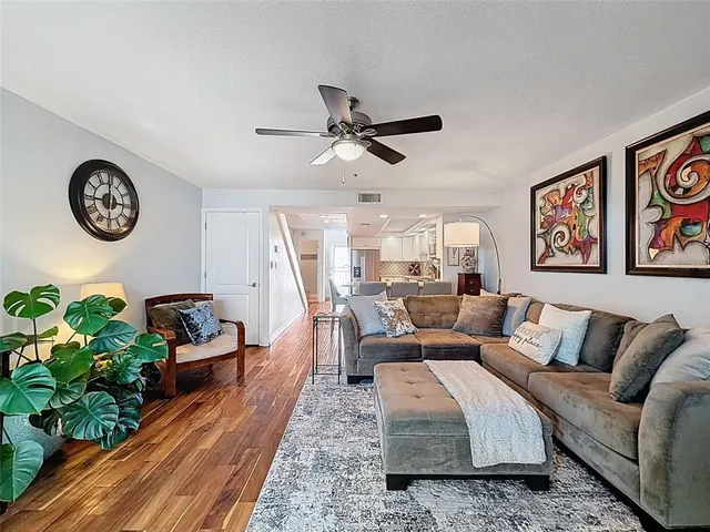 a living room with furniture and a window