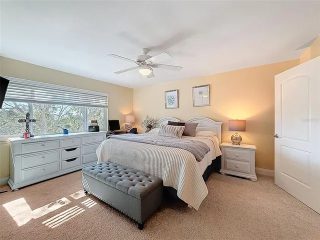 a bathroom with a toilet and a tub