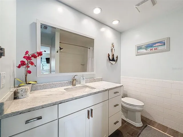 a bed room with furniture and a window