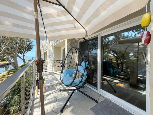 a view of a large building with large trees