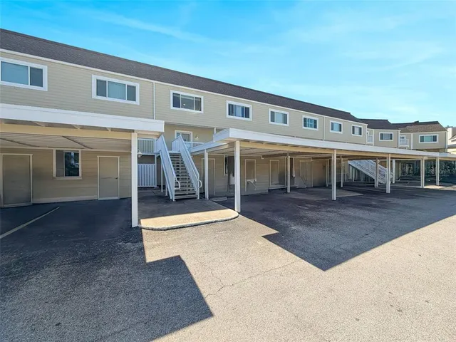 a view of hallway with chandelier