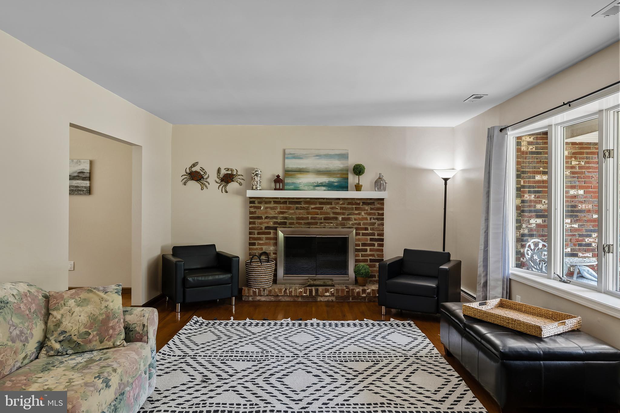 77 Taunton Road Medford, NJ 08055 - Photo 3 of 28 Living room with wood burning fireplace