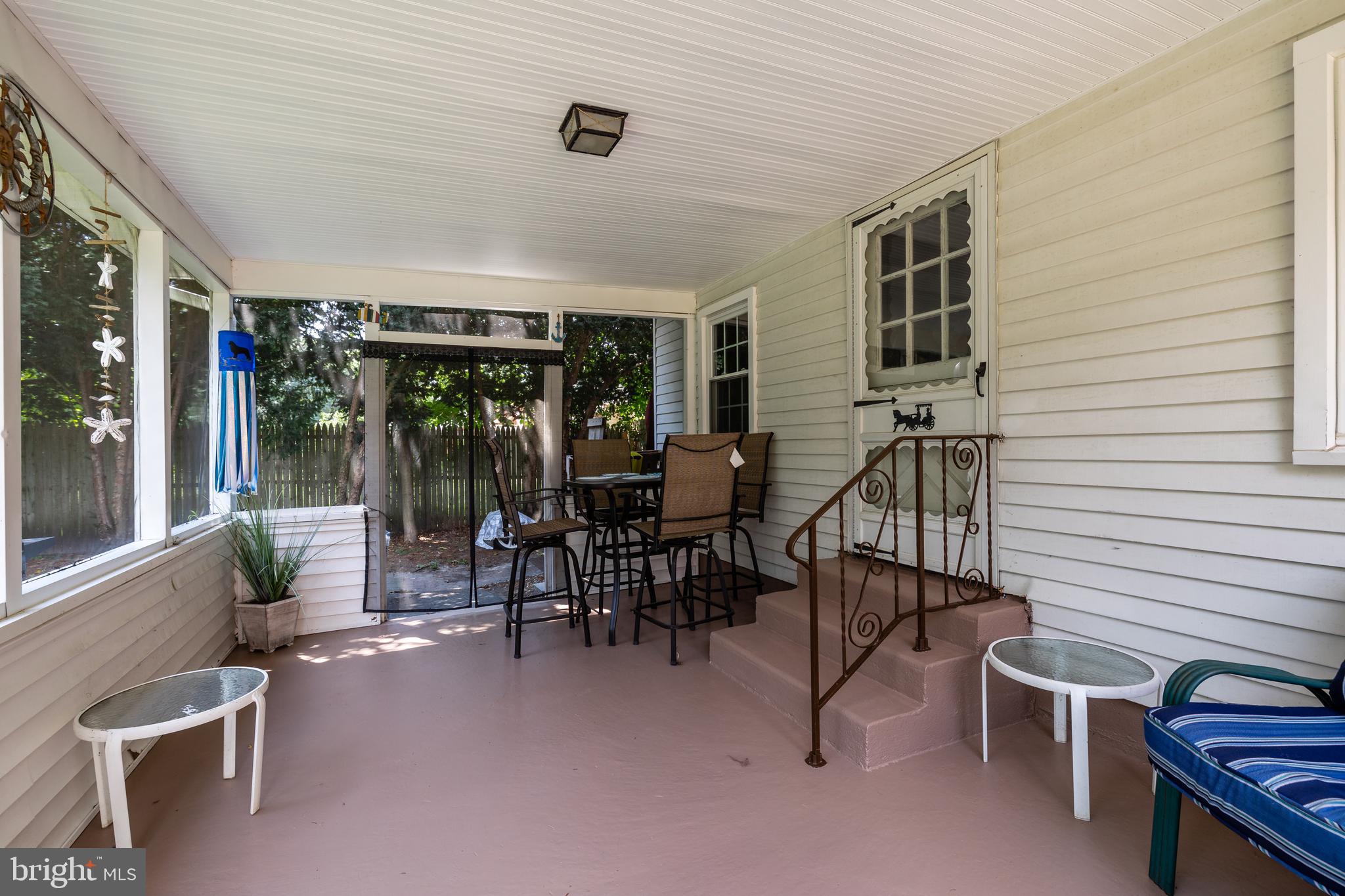 77 Taunton Road Medford, NJ 08055 - Photo 22 of 28 Screened in back porch with steps to family room