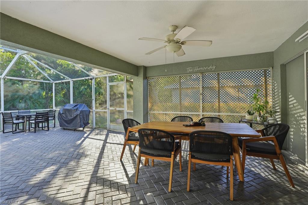 272 Johnnycake Drive Naples, FL 34110 - Photo 28 of 33 a view of a dining room with furniture window and outside view
