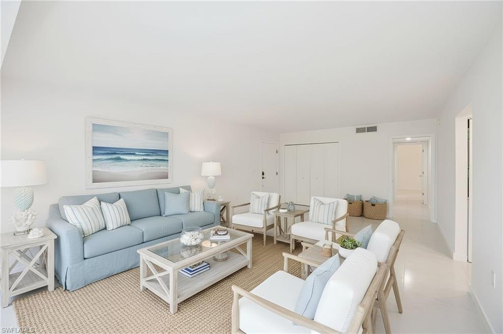 4180 Crayton Road, Unit E4 Naples, FL 34103 - Photo 2 of 25 Living Room Staged