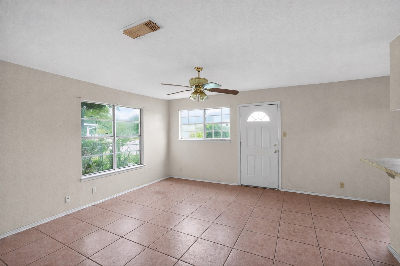 6015 Carnation Terrace Austin, TX 78741 - Photo 11 of 12 a view of an empty room with a window