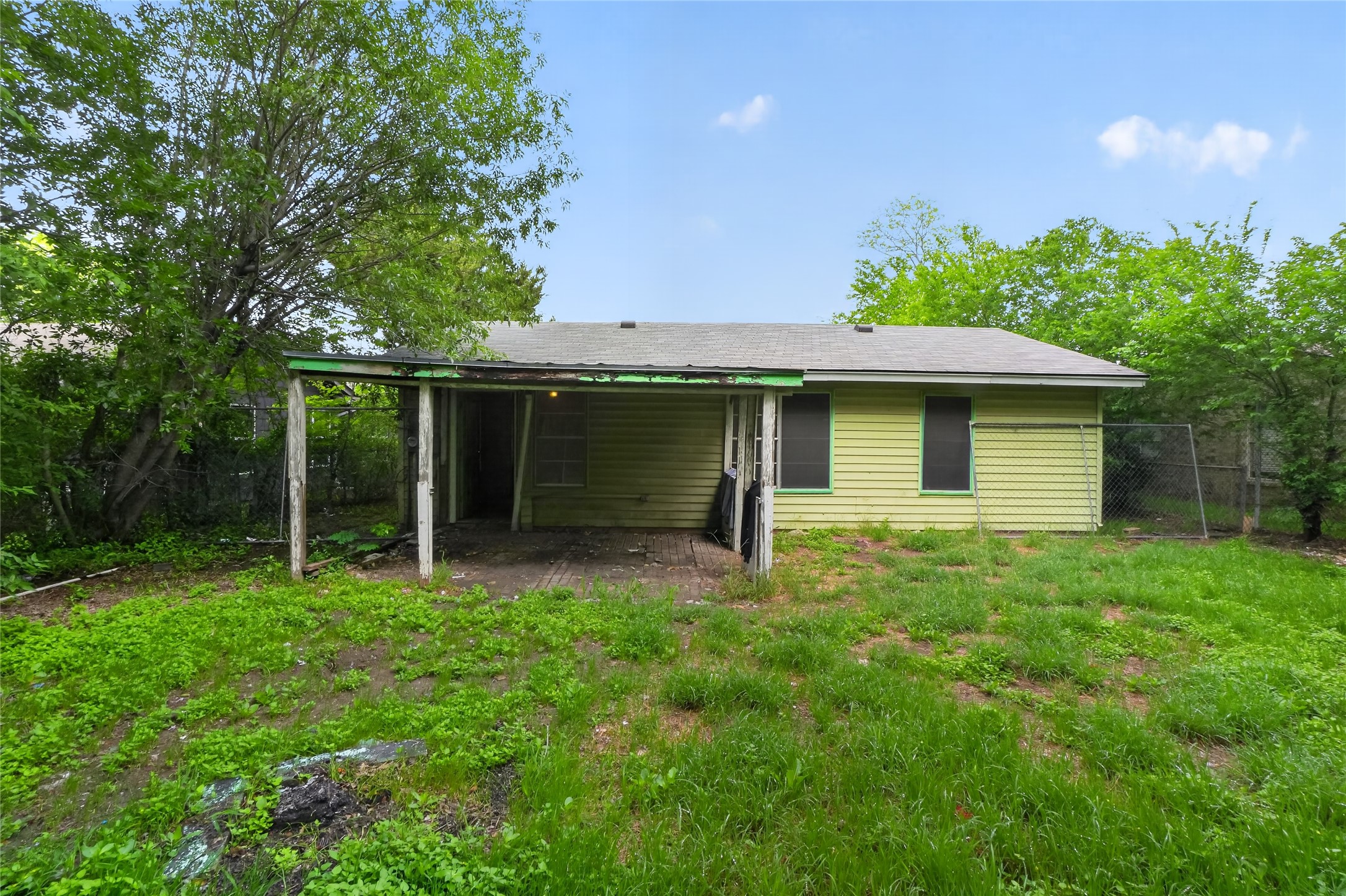 6015 Carnation Terrace Austin, TX 78741 - Photo 5 of 12 a view of a house with a yard and tree