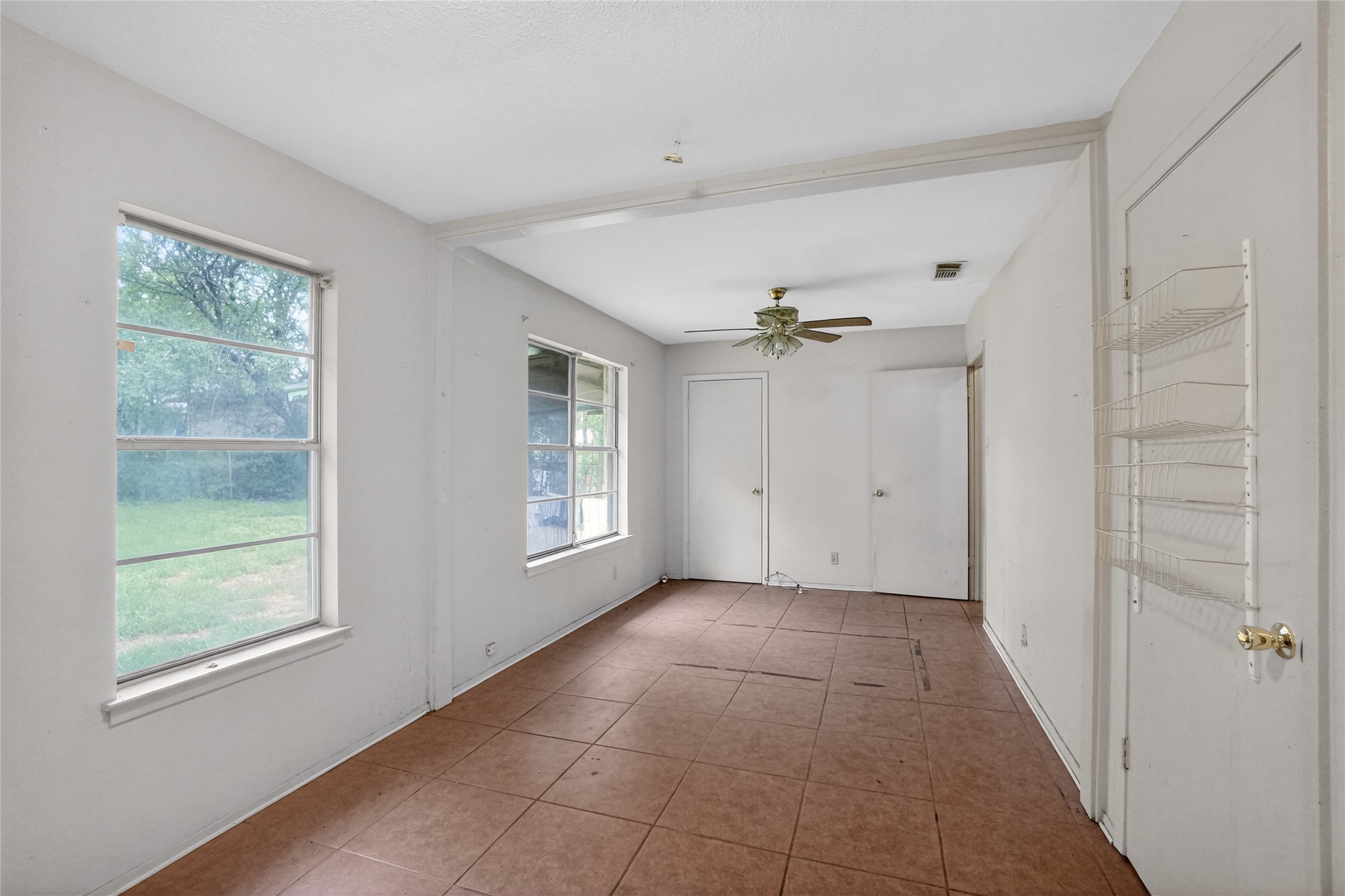 6015 Carnation Terrace Austin, TX 78741 - Photo 9 of 12 a view of an empty room with a window