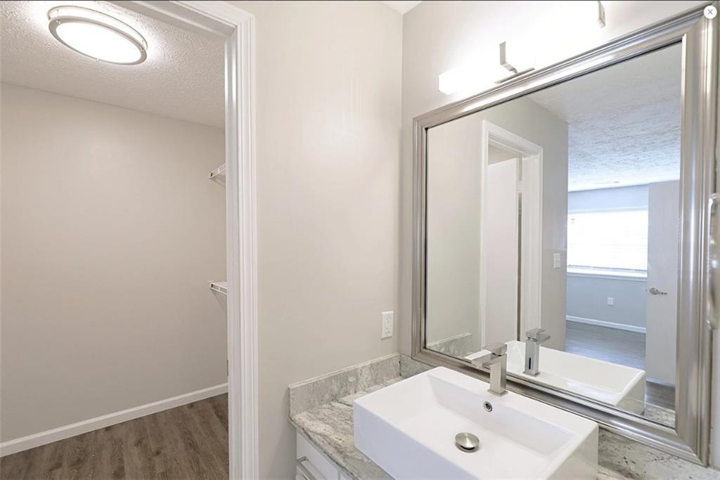 1108 Bridle Trail Coraopolis, PA 15108 - Photo 5 of 12 a bathroom with a sink and a mirror