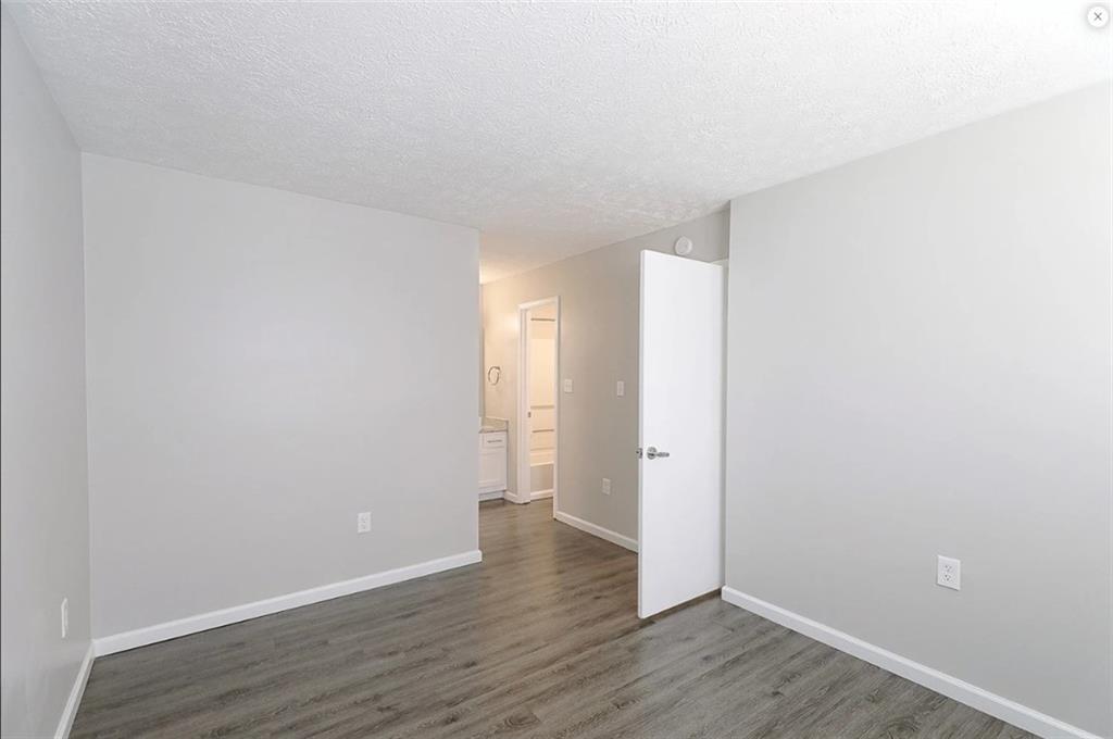 1108 Bridle Trail Coraopolis, PA 15108 - Photo 7 of 12 a view of an empty room with wooden floor