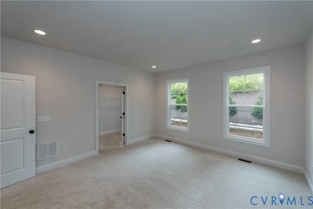 an empty room with windows