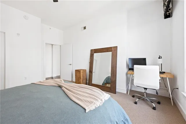 a bathroom with a bathtub a sink and a mirror