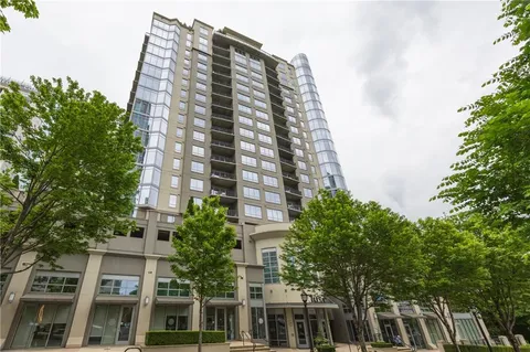a view of a city with tall buildings