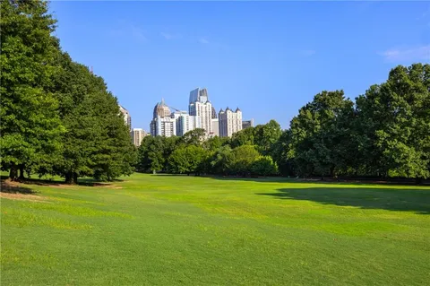 a view of a city with tall buildings