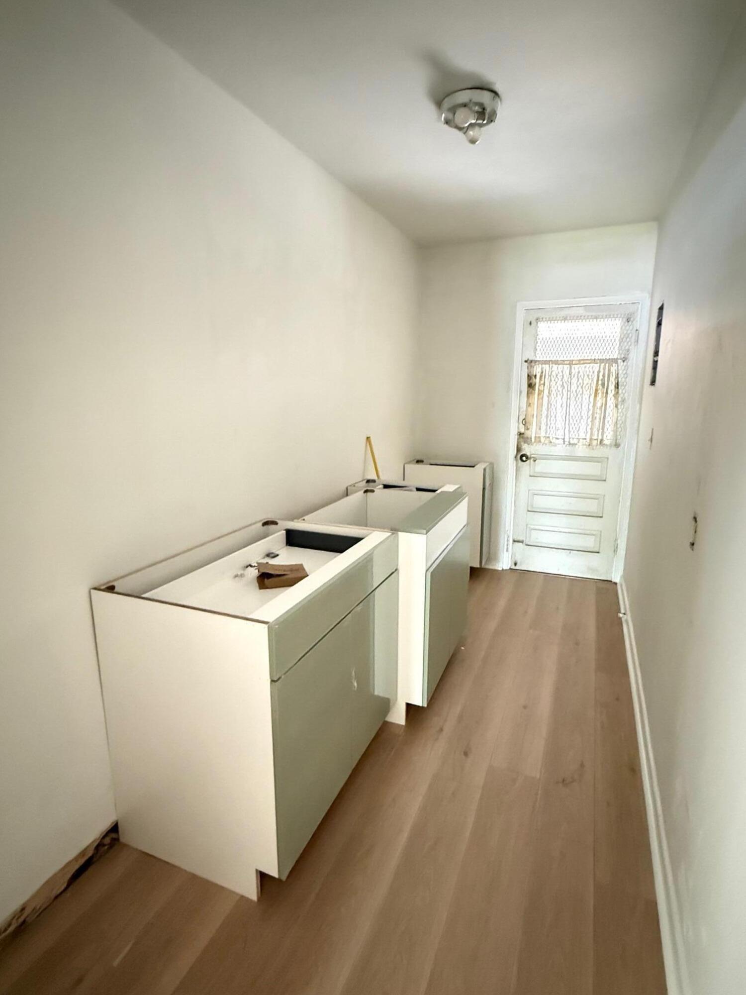 523 48th Street West Palm Beach, FL 33407 - Photo 7 of 33 a utility room with dryer and washer