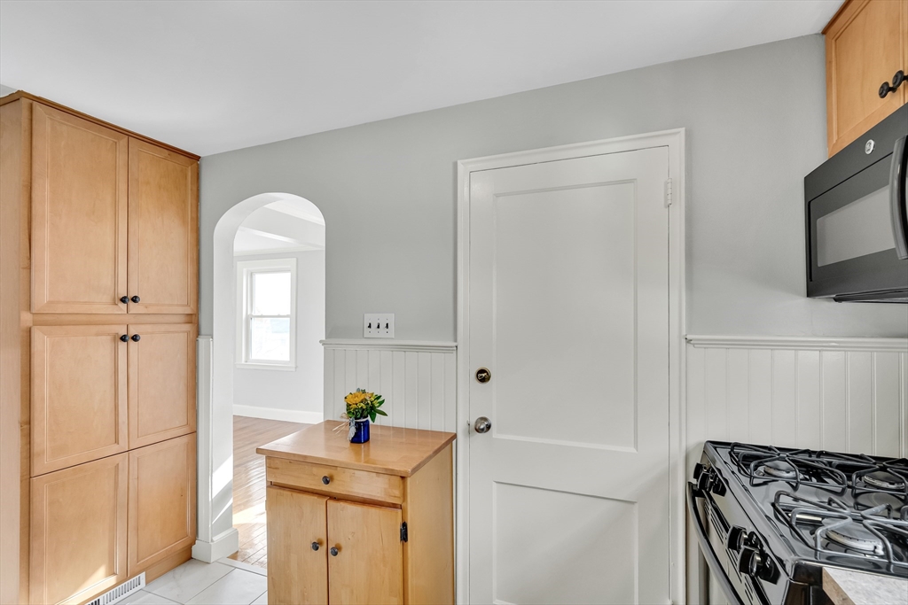 23 Weeks Avenue Boston, MA 02131 - Photo 17 of 34 a kitchen with a refrigerator sink and stove