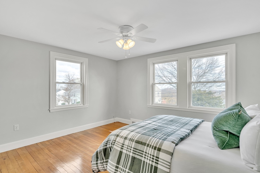23 Weeks Avenue Boston, MA 02131 - Photo 18 of 34 a bedroom with a bed and a window