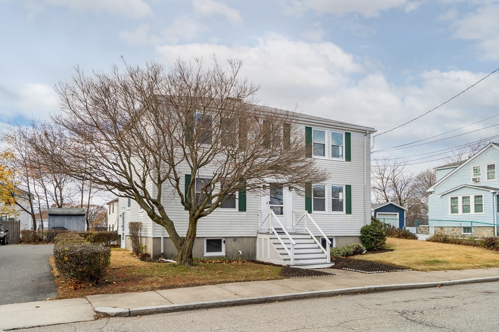 23 Weeks Avenue Boston, MA 02131 - Photo 2 of 34 a front view of a houses with yard