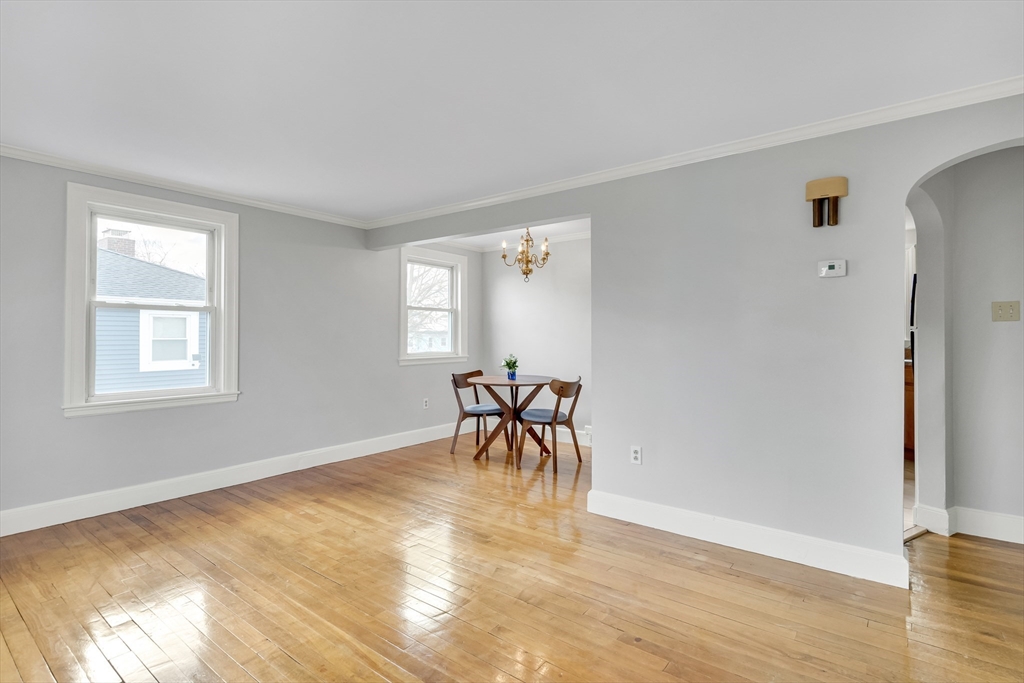 23 Weeks Avenue Boston, MA 02131 - Photo 8 of 34 a view of a room with a window and wooden floor