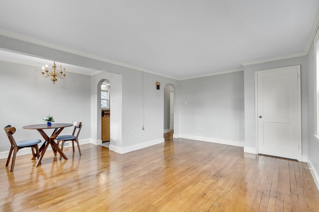 23 Weeks Avenue Boston, MA 02131 - Photo 10 of 34 a view of a livingroom with furniture and wooden floor