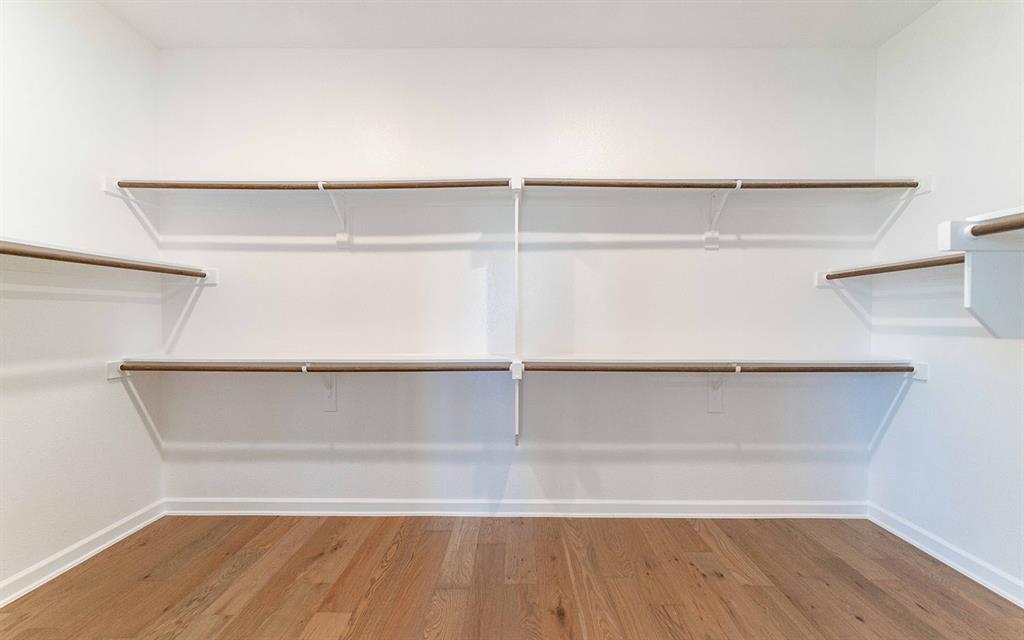 2008 Casting Ridge Mesquite, TX 75181 - Photo 17 of 24 a view of a room with racks on the wall